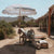 Parasol vintage rayé bleu marine avec franges ø180 x 230.