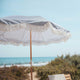 Parasol vintage rayé bleu marine avec franges ø180 x 230.