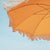 Parasol vintage orange avec franges ø170 x 210.