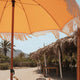 Parasol vintage orange avec franges ø170 x 210.