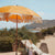 Parasol vintage orange avec franges ø170 x 210.