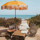 Parasol vintage orange avec franges ø170 x 210.