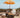 Parasol vintage orange avec franges ø170 x 210.